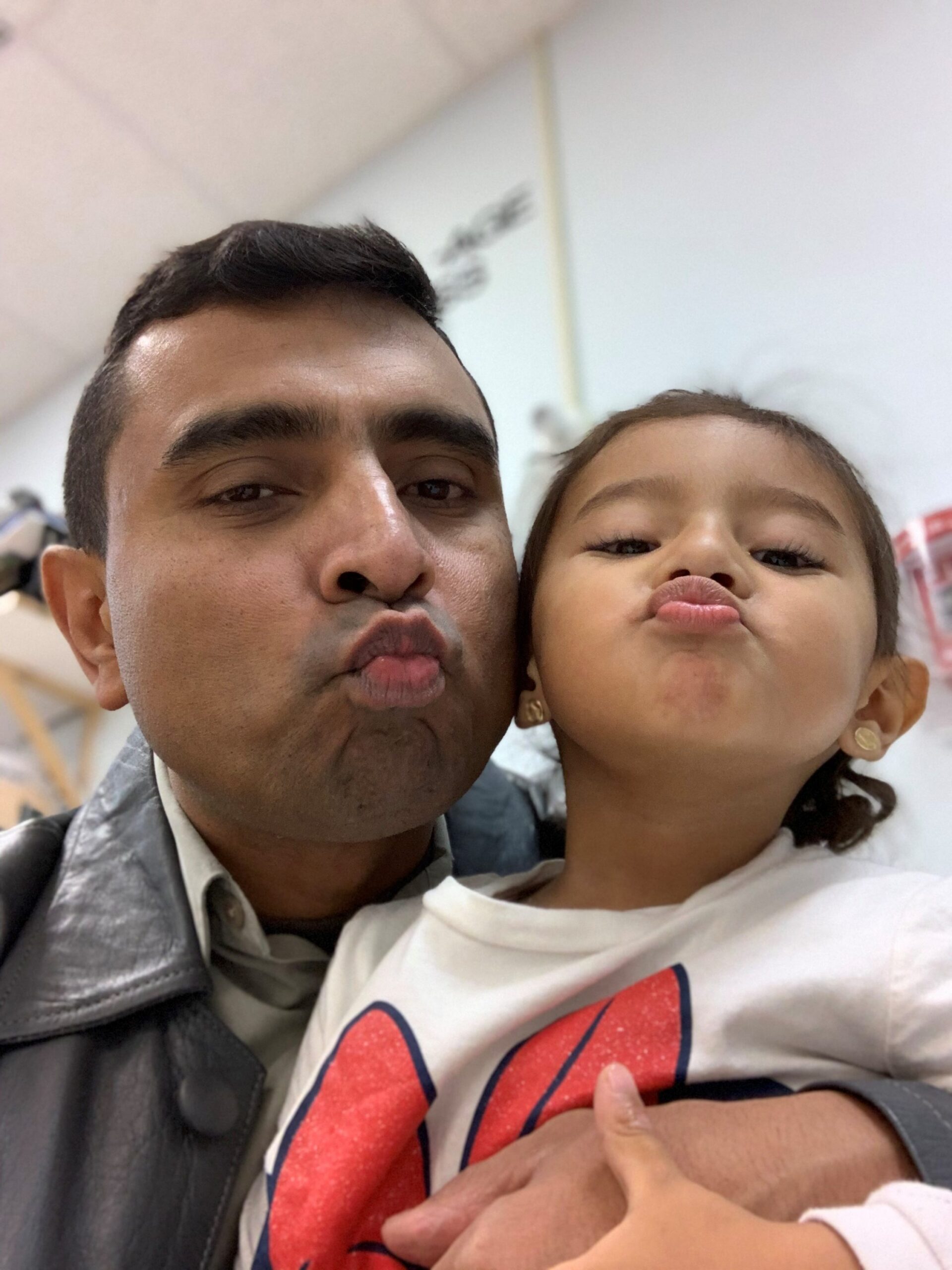 Walter Camargo with his daughter